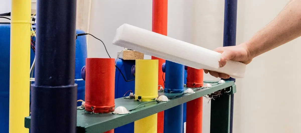 Color-coded drums with embedded piezo sensors.