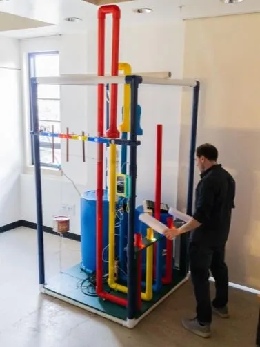 The Jam Station: four instruments facing a central tower display.