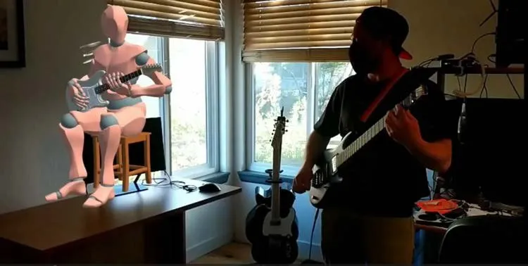 Playing guitar with an AI-driven virtual guitarist.